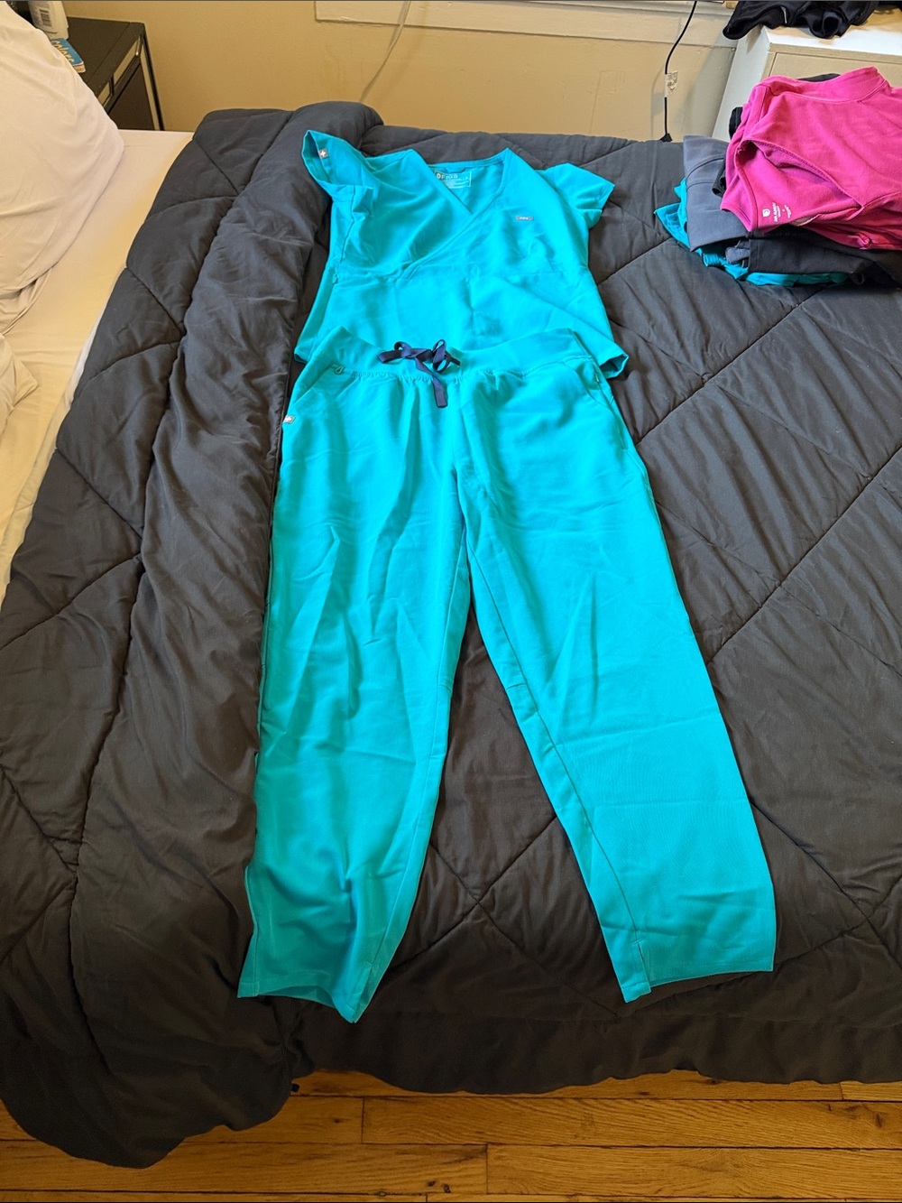 FigsTeal peplum top with high waisted tapered bottoms